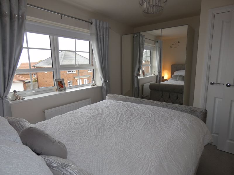 Bedroom One- click for photo gallery